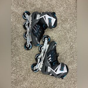 Woman’s Black & Blue roller skates Skates size 10